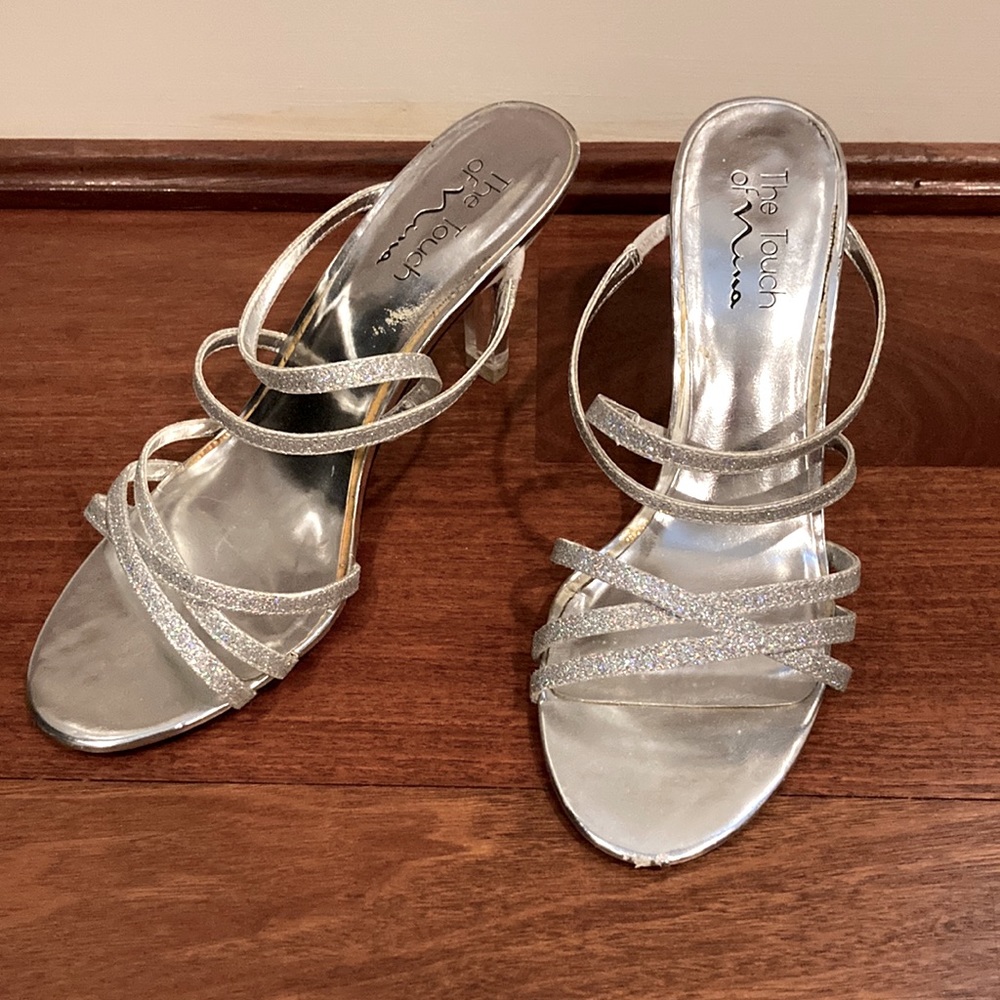 Shiny Silver slip on Heels with a clear heel and glitter straps
